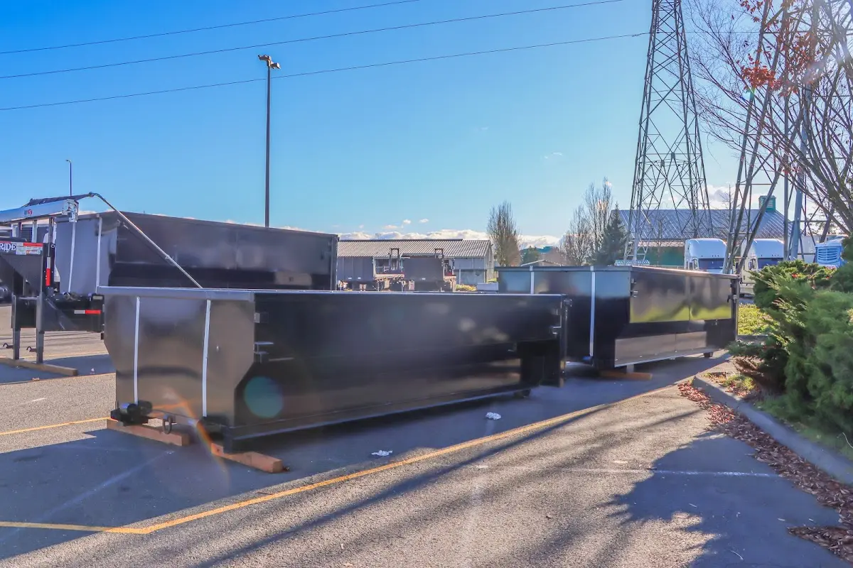 Roll-off dumpster ready for waste disposal at job site for 12 Yard Dumpster Rental in Williams